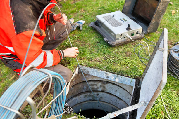 sewage cleaner doing diagnosis of the pipeline with camera